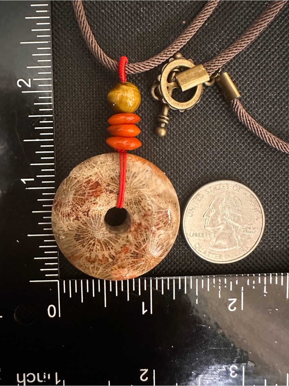 Handcrafted Red and Brown Coral Fossil Donut Pendant Necklace on Brown Rope - Picture 15 of 16